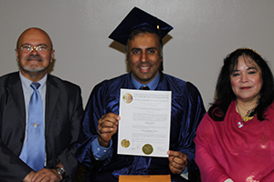Dr.Abbey with Dr Fernadnez_&_Haddasa Holding up Phd Degree